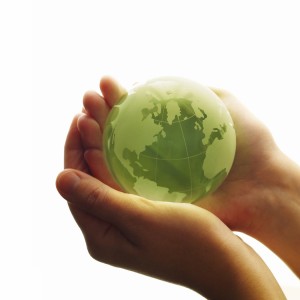 Hands holding a globe