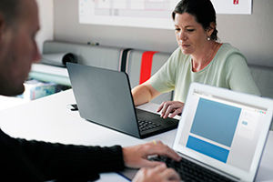 A woman at a computer