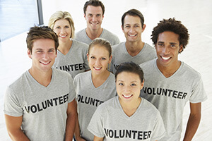 Community Service Volunteering puts a smile on everyone's face, invite your clients to join your team in a day of community service.